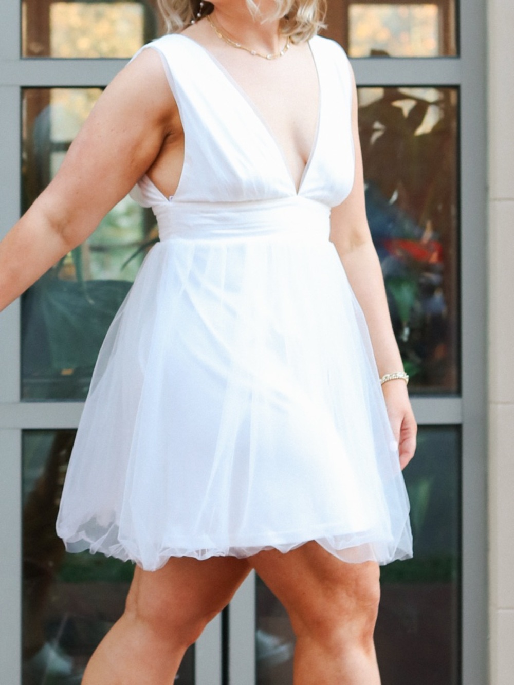 Lulu’s White Sleeveless V-Neck Mini Dress